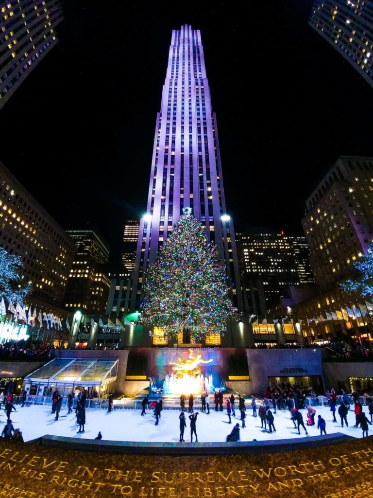 New York City at night under Rockefeller Center Plaza